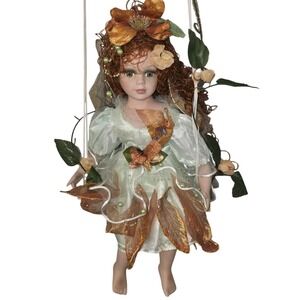 Cathay Collection #1104 Porcelain Doll Fairy On Swing Red Hair Irish Green Eyes